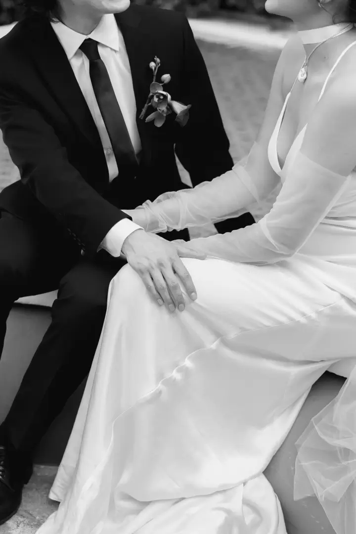 Bride and groom kissing during the ceremony